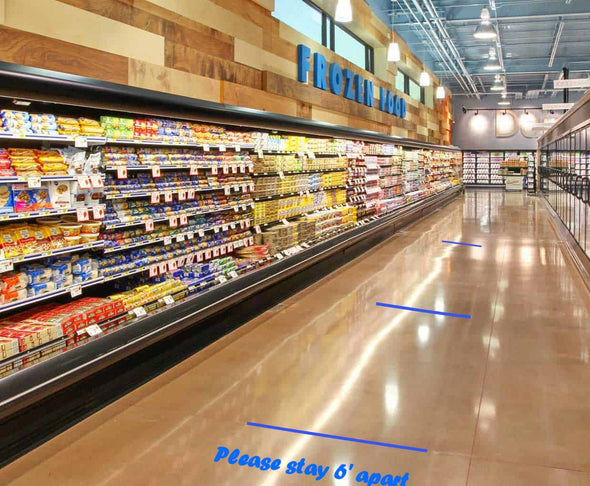 Image of grocery store floor with caution markings using 15mm bold tip highly visible Fluorescent Safety Markers by Chal Ink 
