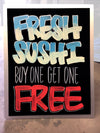 Image of 11"x17" Chalk Ink aluminum countertop chalkboard sign with fresh sushi written with Chalk Ink wet wipe markers