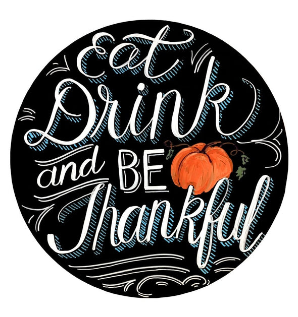 Image of round chalkboard with the phrase Eat drink and be thankful written using chalk ink liquid chalk markers in colors white and turquoise and a pumpkin drawn in orange chalk ink marker