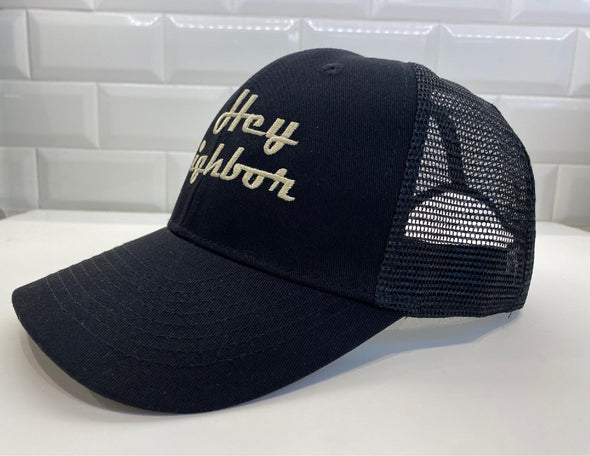 Hey Neighbor embroidered 6 panel retro trucker hat side view