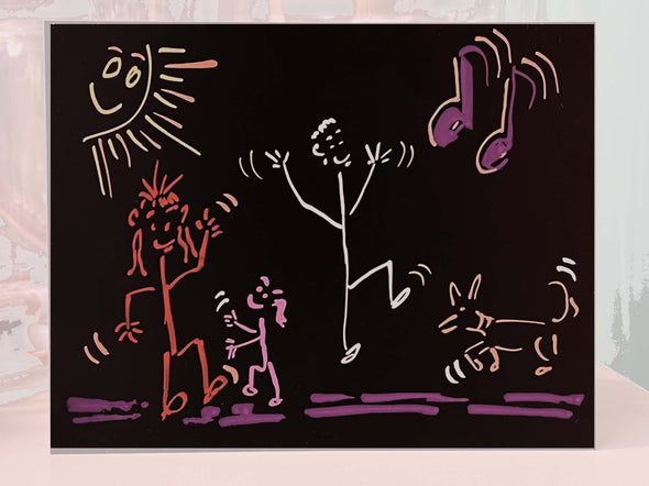 Image of a drawing on a black chalkboard of stick figures dancing 