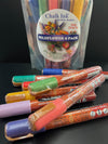 Closeup product image of chalk ink wildflower pack liquid chalk markers with packaging standing in the background